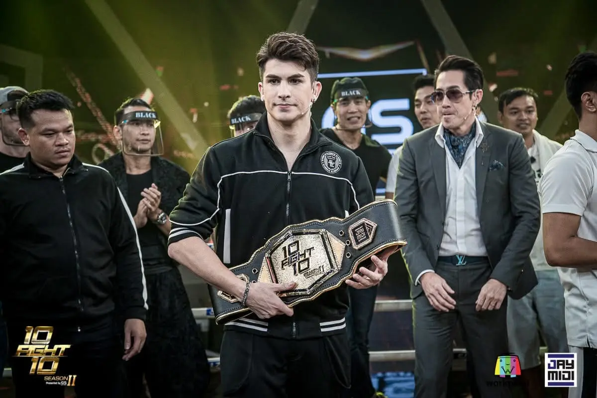 Antoine Pinto holding the 10 Fight 10 championship belt