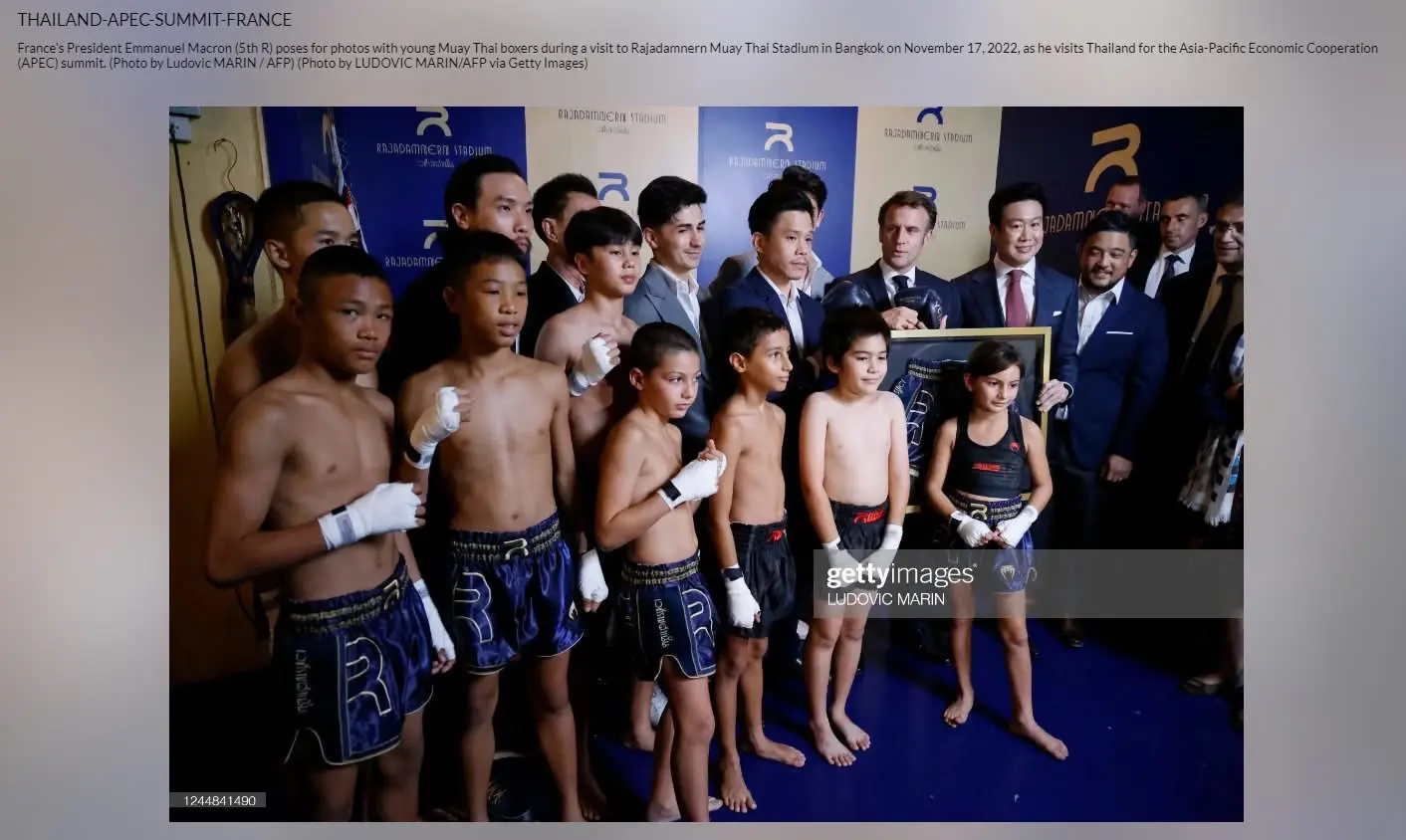 President Macron with young Muay Thai athletes and the Pinto brothers