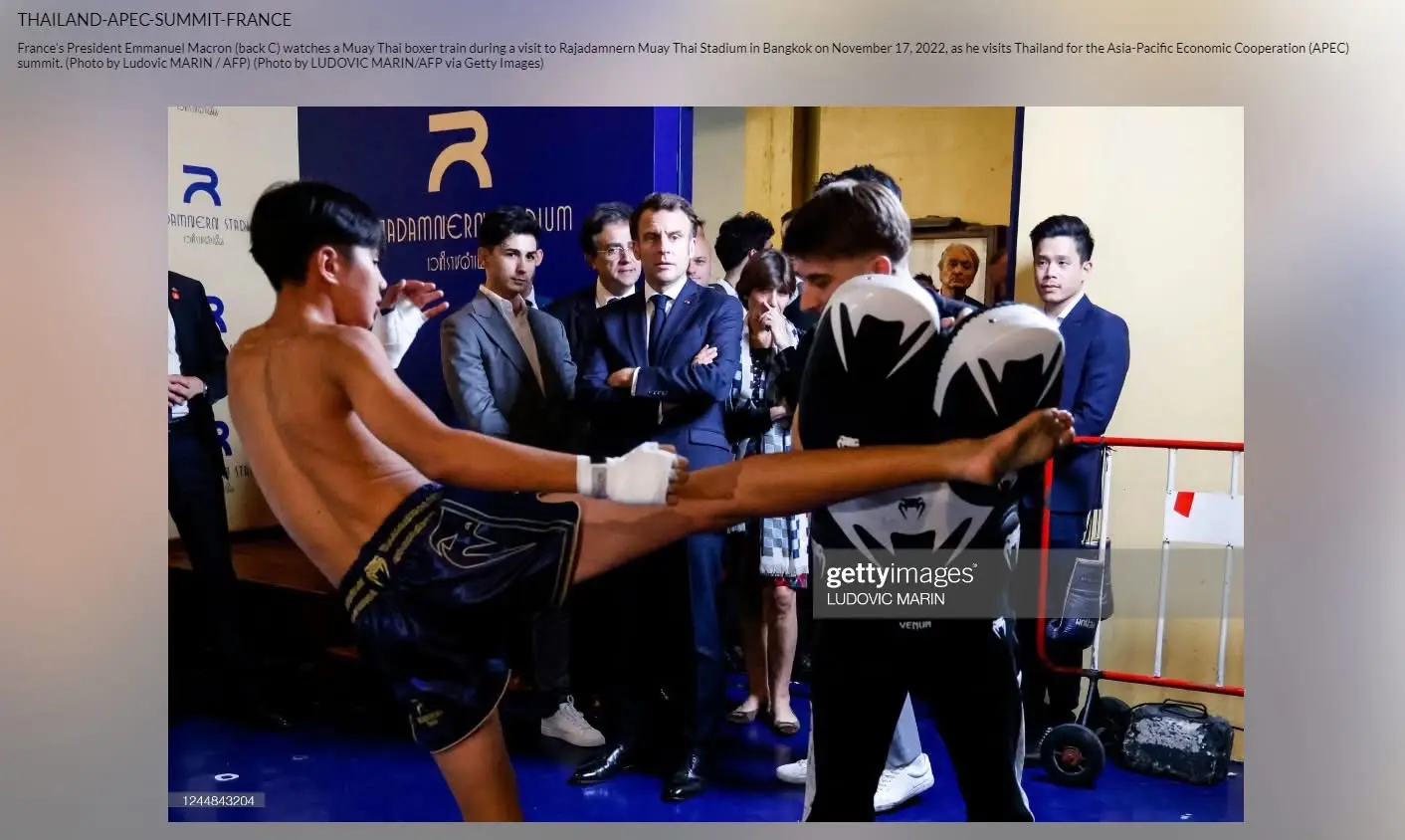 President Macron observing a Muay Thai demonstration