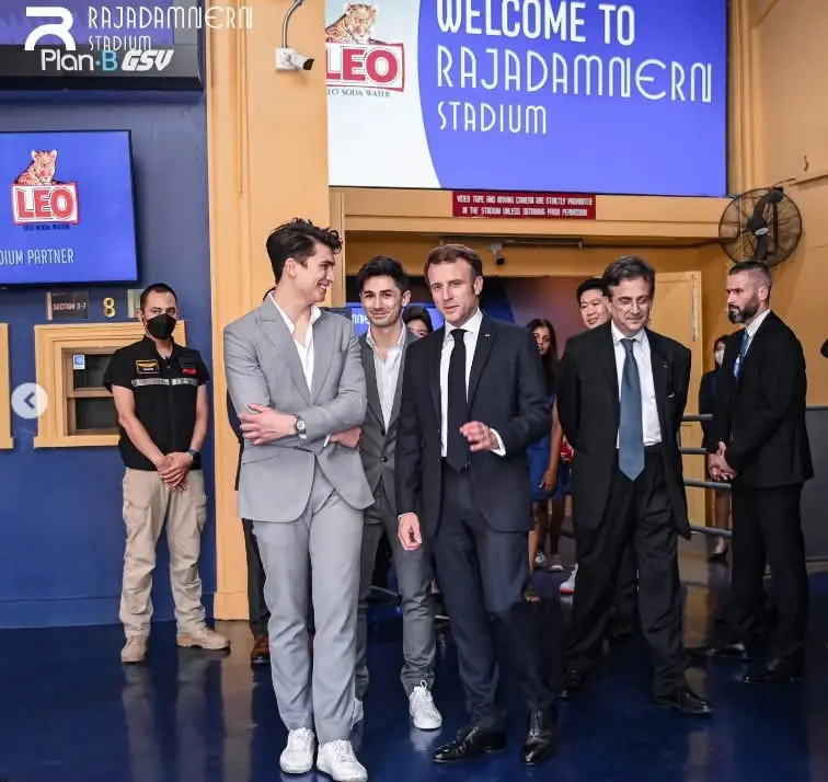 Antoine and Leo Pinto with French President Emmanuel Macron at Rajadamnern Stadium