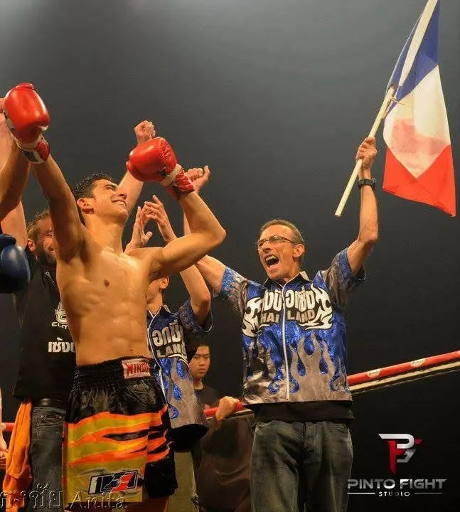 Antoine Pinto celebrating a victory with his father
